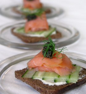Smoked Salmon on Potato Blini with Caviar and Crème Fraiche